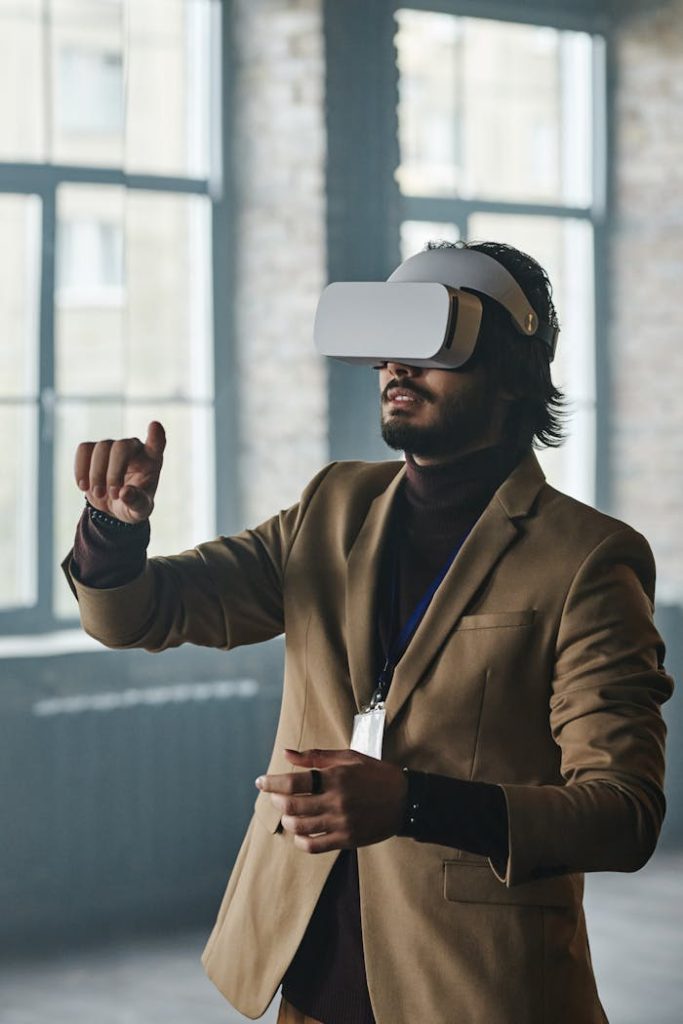 Adult man wearing VR headset in an office environment, exploring innovative technology.